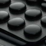 Silicone rubber feet used on electronic equipment for vibration control